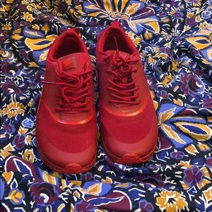 Red Nike Thea.